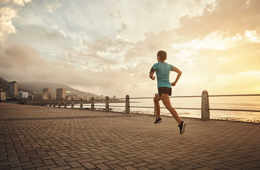 Woman running outdoors for exercise