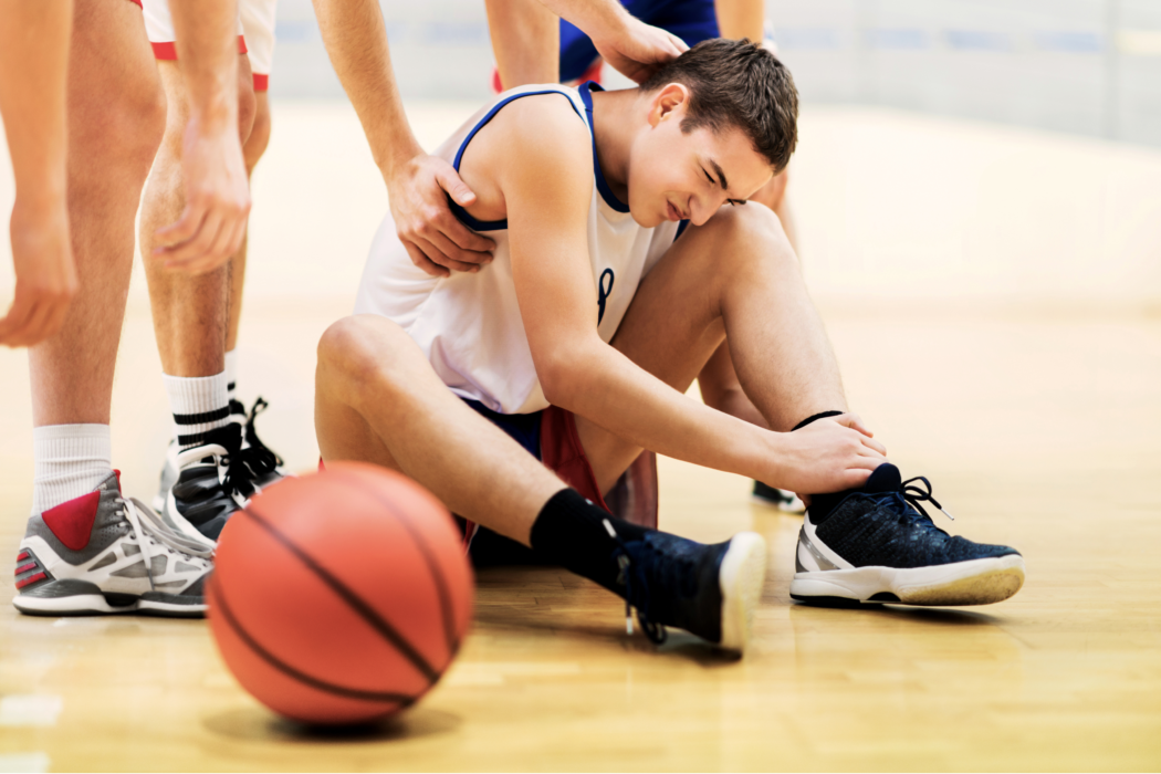 Prevent Sports Injury - Basketball Playing On The Court With A Sports Injury